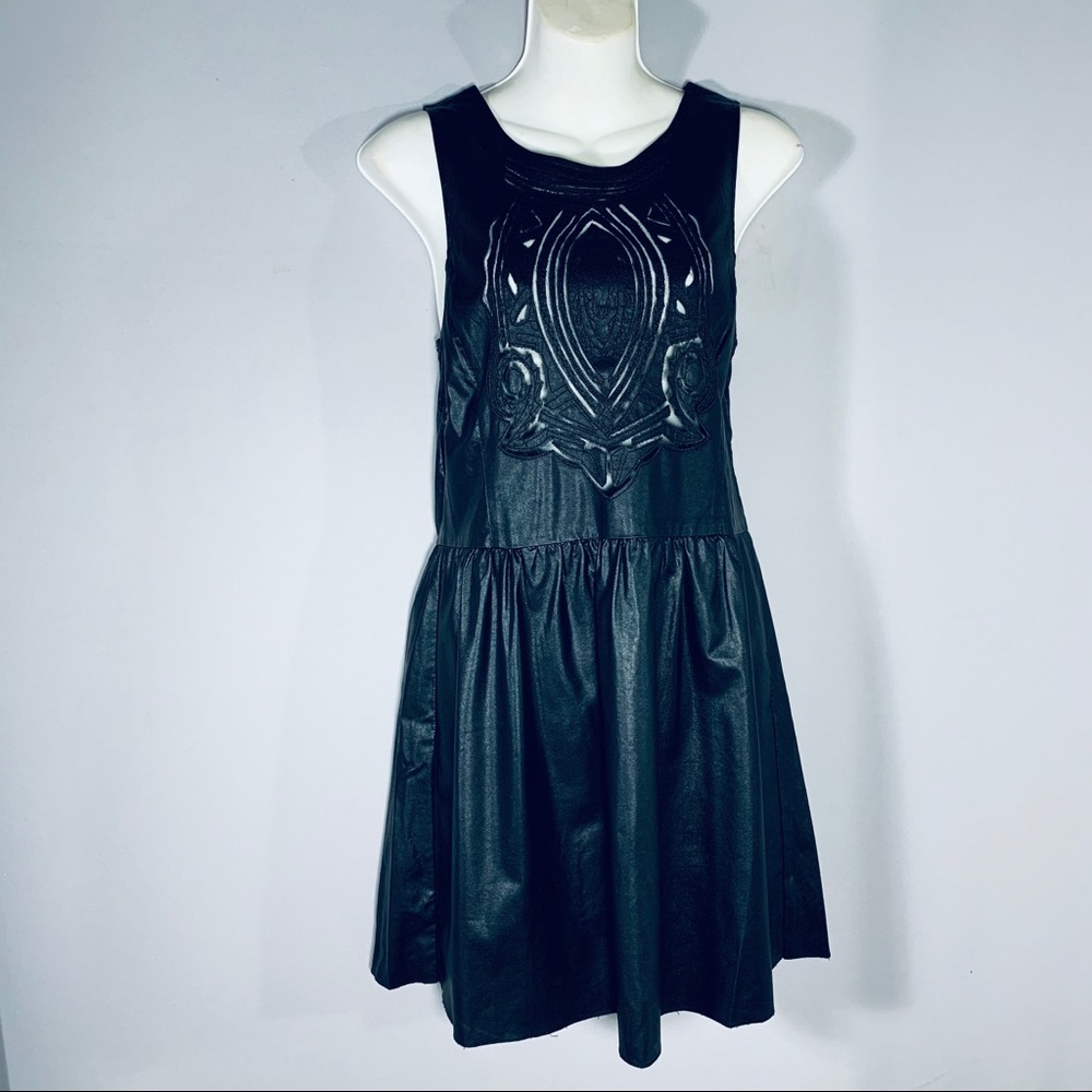 Faux leather dress with embroidery and cut-outs